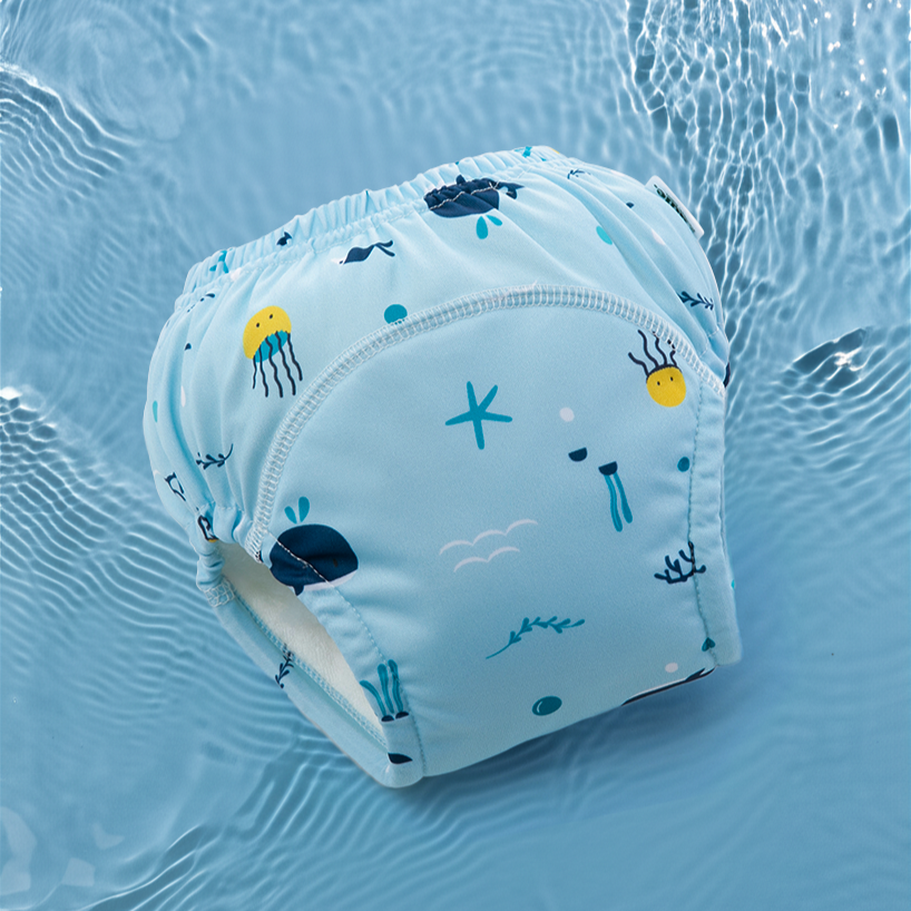 Rudie Baby toilet training pants in Whales print, light blue ocean design
